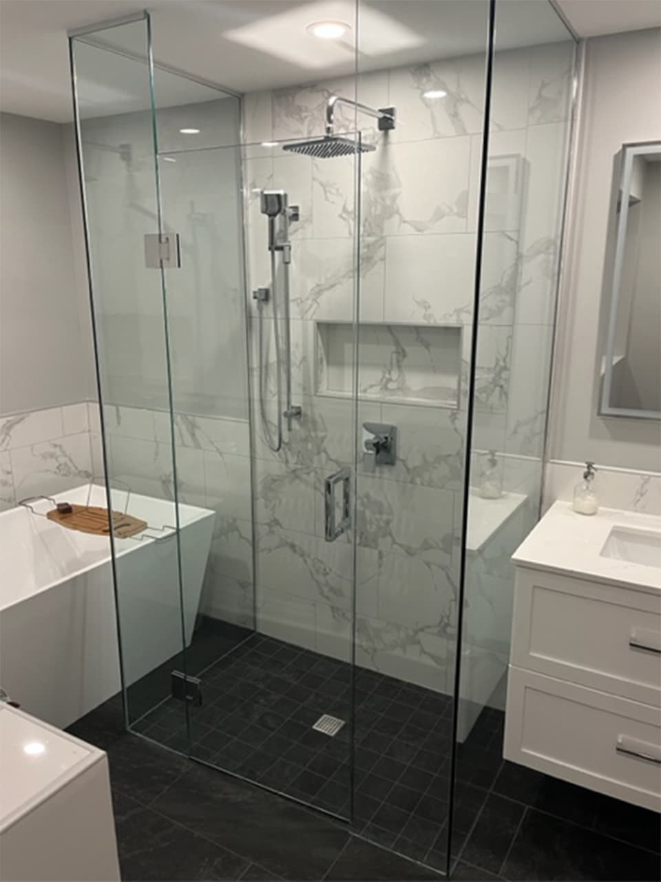 Picture of beautiful remodeled bathroom from different angle.