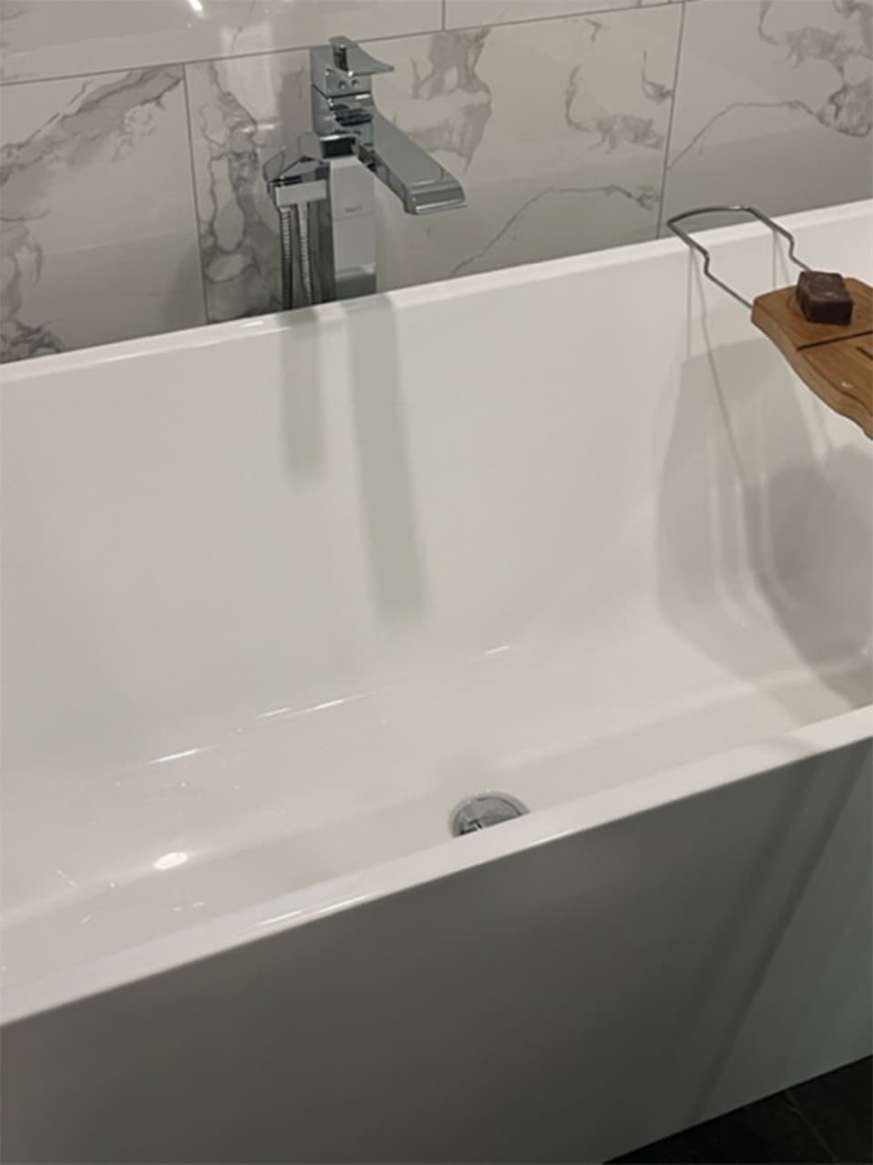 Picture of beautiful deep tub.